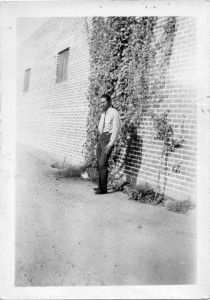 c. 1933, man by wall